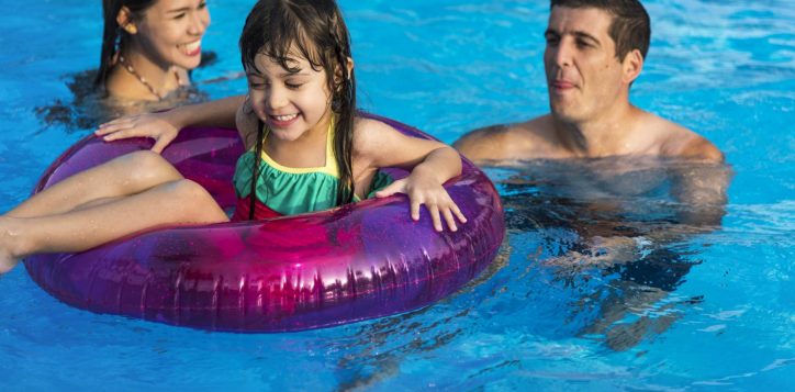 family-enjoying-nice-day-pool-2